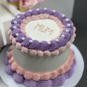 Mums Day pink and purple vintage cake